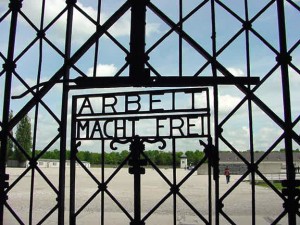 Sign at the entrance of Dachau Concentration Camp | Munich Experience by Franz Schega